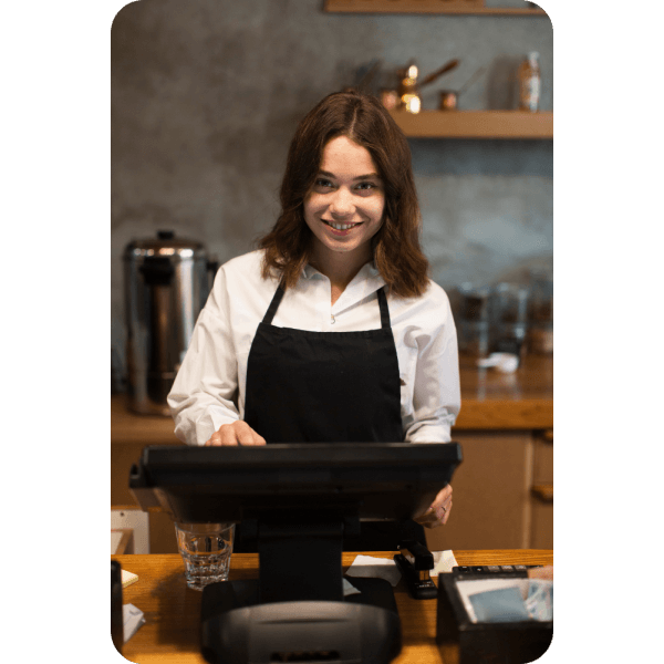 Tailored to Your Business Needs A Restaurant Worker Using A Paywint POS System To Manage Transactions Efficiently