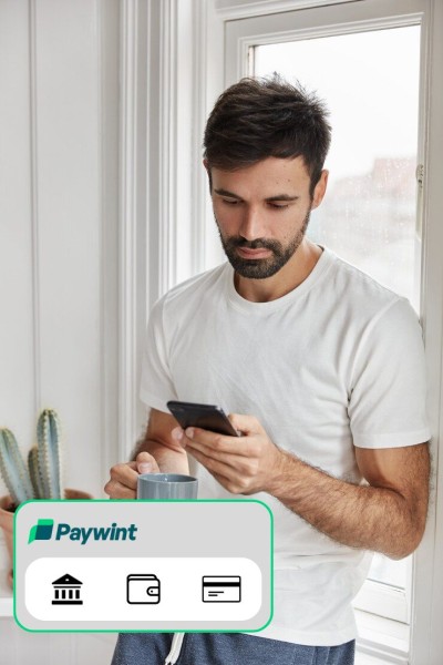Multiple Payment Methods for Flexibility A Customer Making a Contactless Payment Using a Mobile Device and Paywint-Enabled Terminal