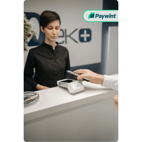 Seamless Integration for Businesses Woman Using Her Smartphone in a Café, with a Paywint Payment Confirmation Pop-Up, Showcasing Instant Transactions