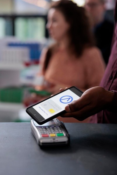 Secure and Reliable Transactions A Customer Making a Secure Mobile Payment at a POS Terminal