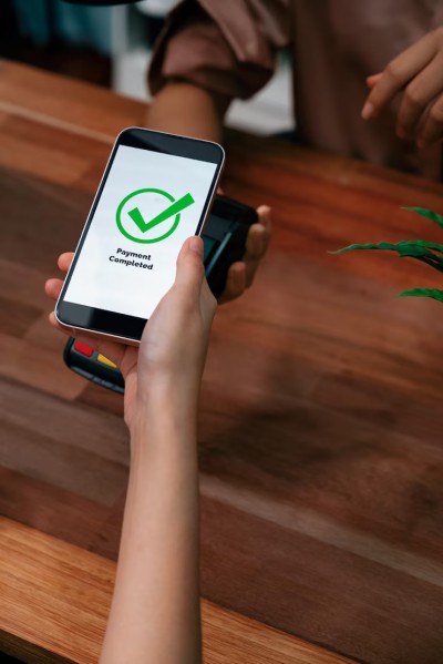 No Stress Setup, Just Get Going Mobile Expense Tracking Categories on a Smartphone Surrounded by Receipts
