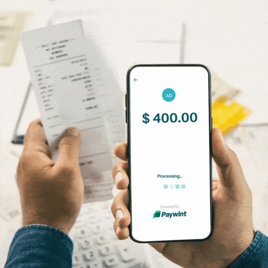 A Person Holds a Receipt in One Hand and a Smartphone Displaying a $400 Transaction Processing, Powered by Paywint