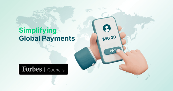 Simplifying Global Payments: How Paywint Is Building a Unified Future for Money Movement Hand Holding Smartphone Showing $50 Payment with "Simplifying Global Payments" Text and Forbes Councils Logo on World Map Background