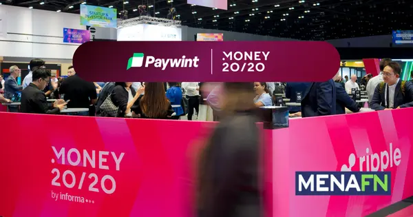 Busy Exhibition Hall at Money 20/20 Event with Paywint and Ripple Booths, Attendees Networking and Exploring Displays